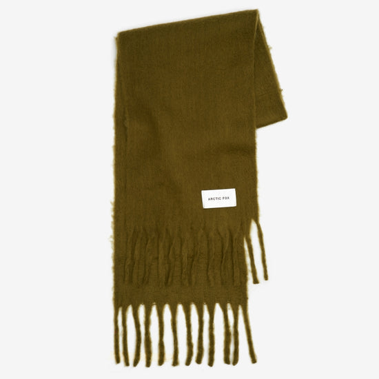 Green scarf with fringes on a white background