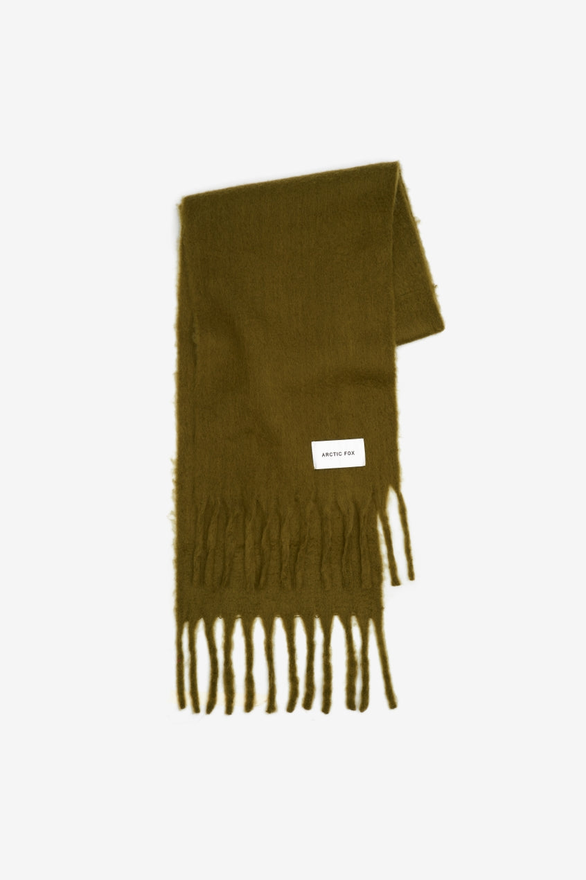Green scarf with fringes on a white background