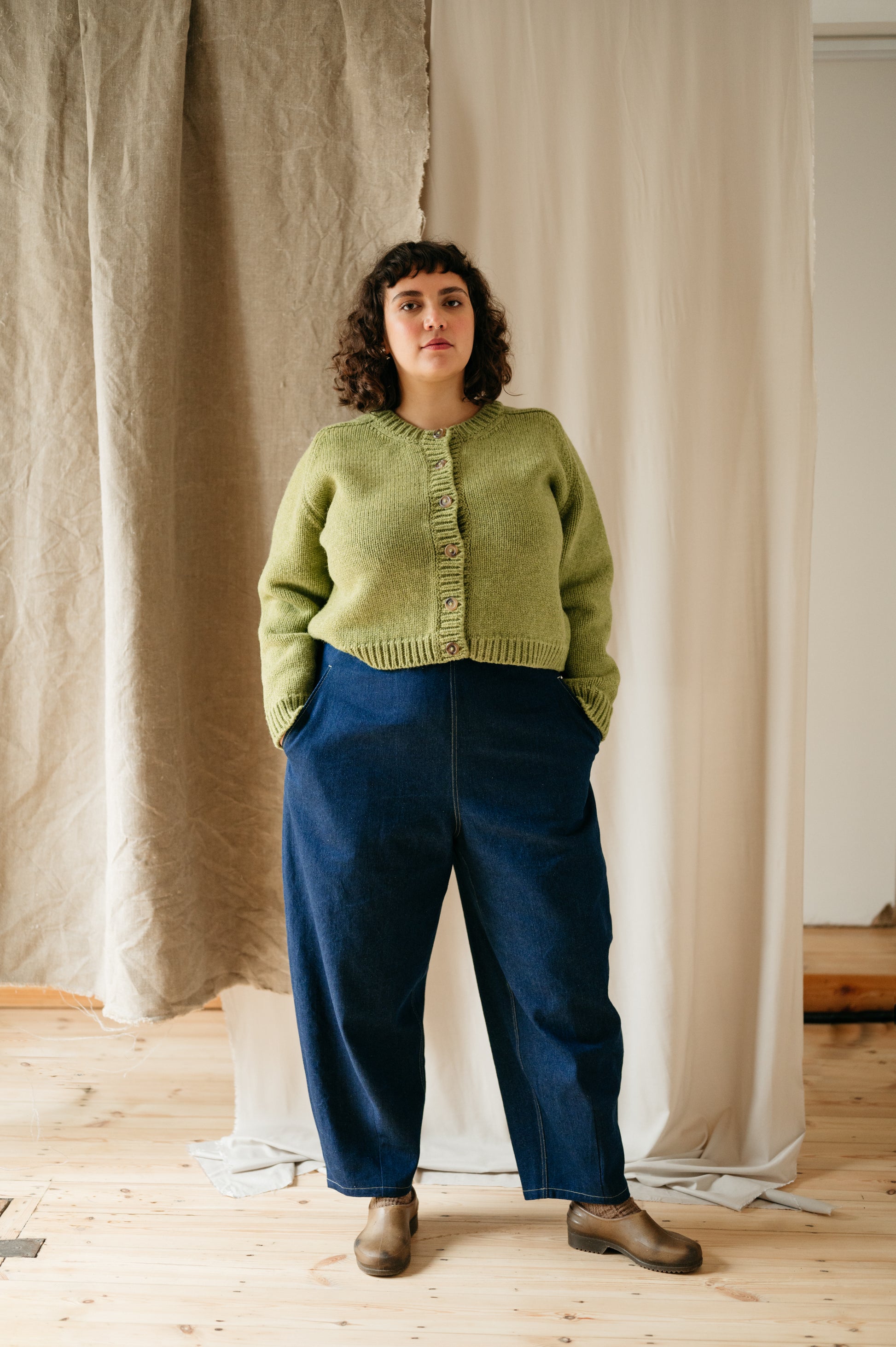 Model wearing barrel leg denim trousers – full front view