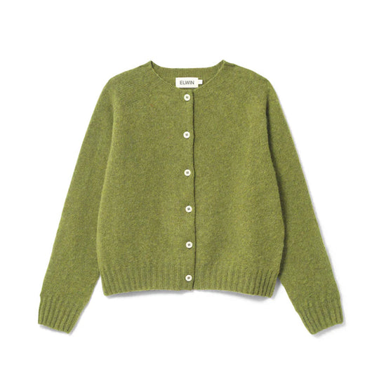 Green knitted cardigan on a white background