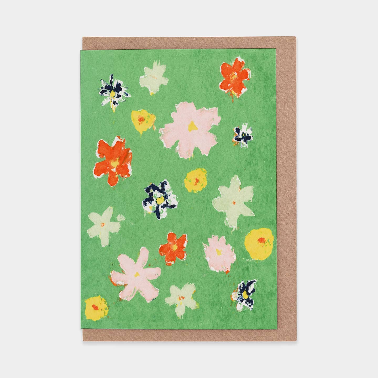 Greeting card with floral design on a green background
