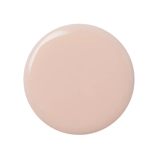 a sample spot of pink nail polish on a white background