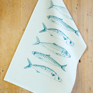 Lottie Day Fish Illustrated Tea Towel On A Wooden Background