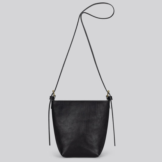 Black handbag on a white background