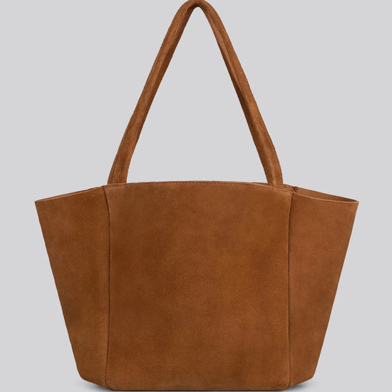 Brown suede tote bag with long handles  on a light gray background