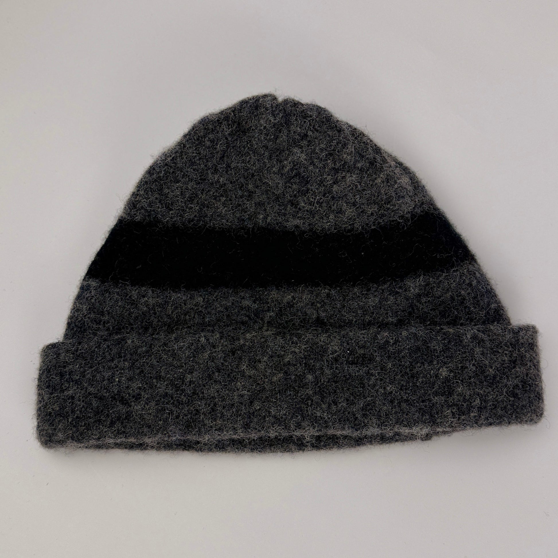 Gray and black wool beanie on a white background