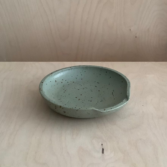 green ceramic spoon rest