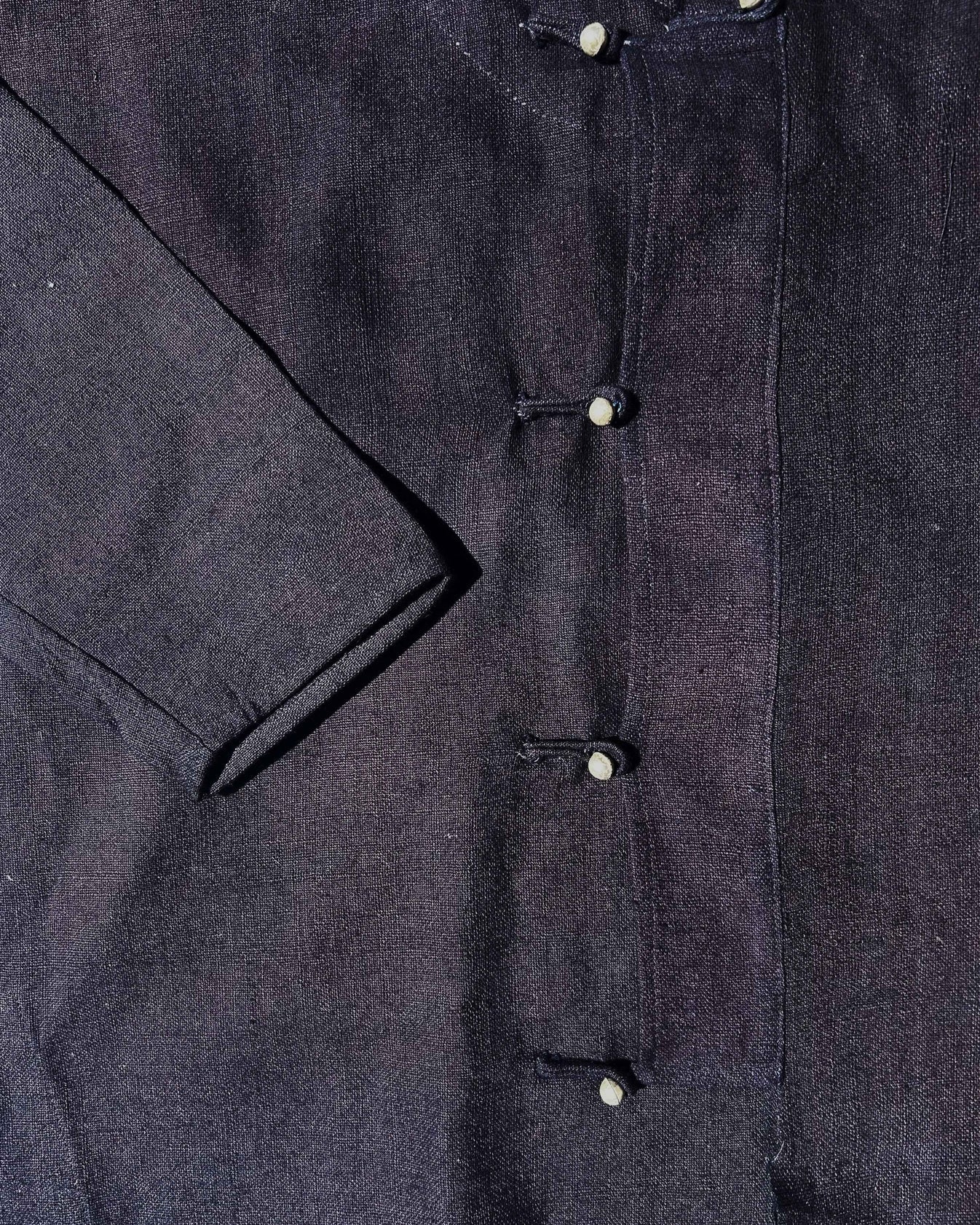 Dark blue jacket with silver buttons