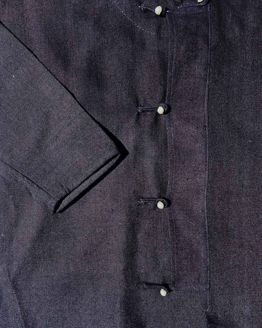 Dark blue jacket with silver buttons