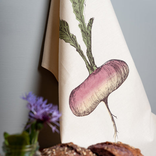 turnip tea towel hanging in a kitchen background