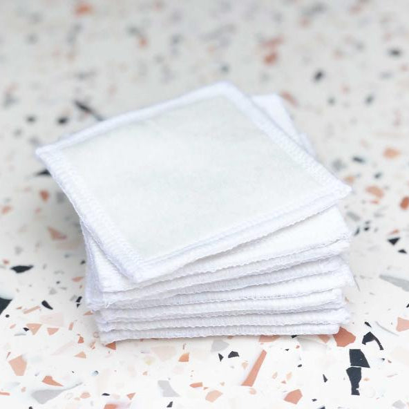 a packed of organic cotton square shaped reusable face pads
