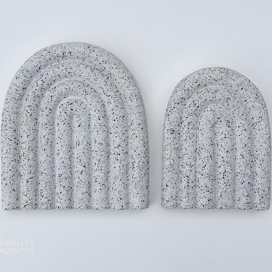 Curved modern soap dish with a smooth, minimalist arc design