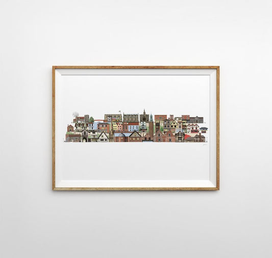 Illustrated print of iconic famous Norwich architecture in various colours in a linear line on a white background. The print is framed horizontally with a thin light wooden frame on a light grey background