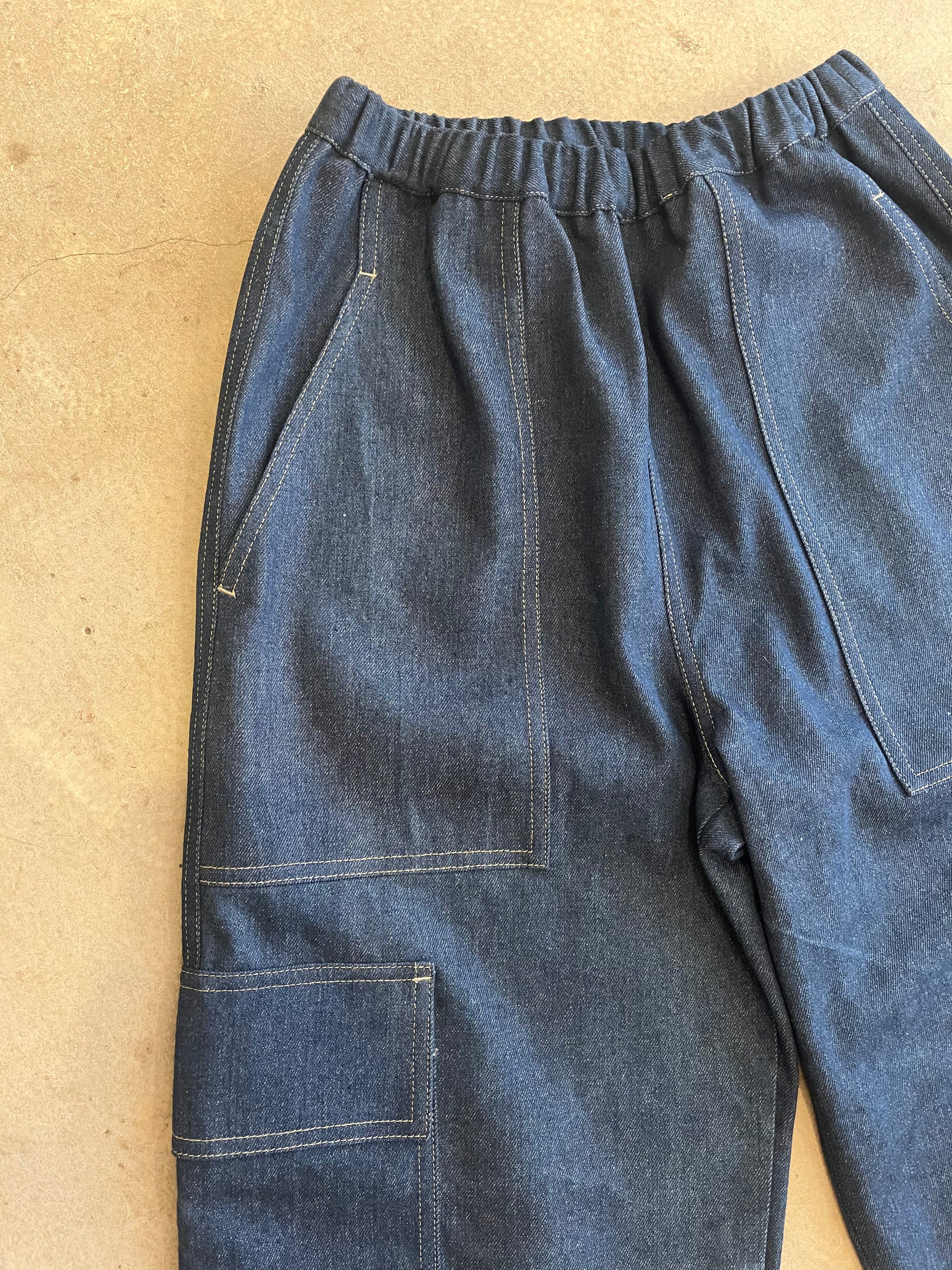 Blue jeans on a beige background