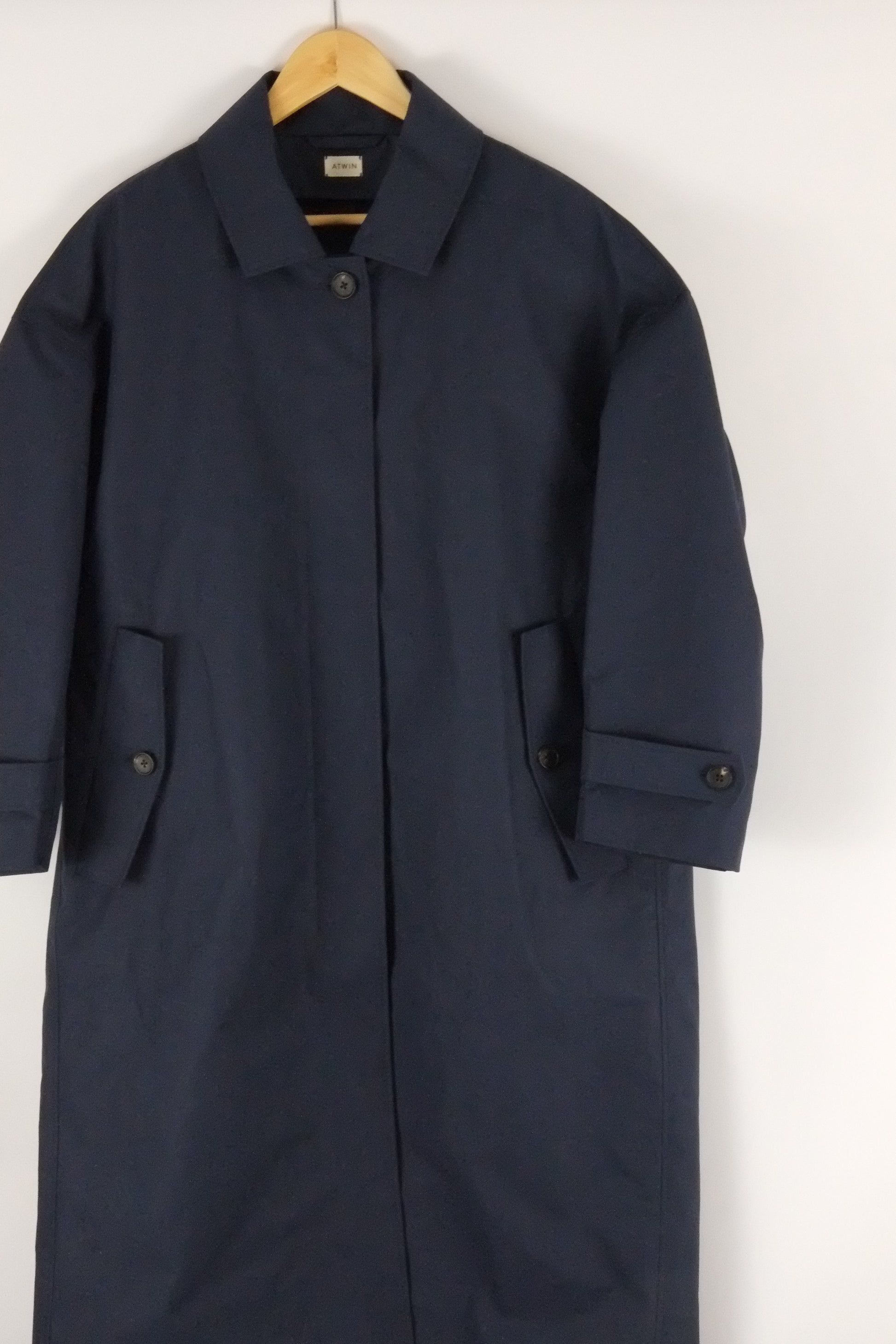 Navy blue mac on a white background