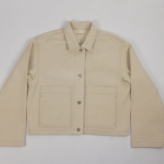 Beige jacket on a light gray background