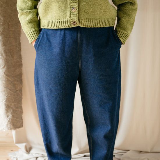 denim barrel leg jeans Styled with a chunky knit and boots