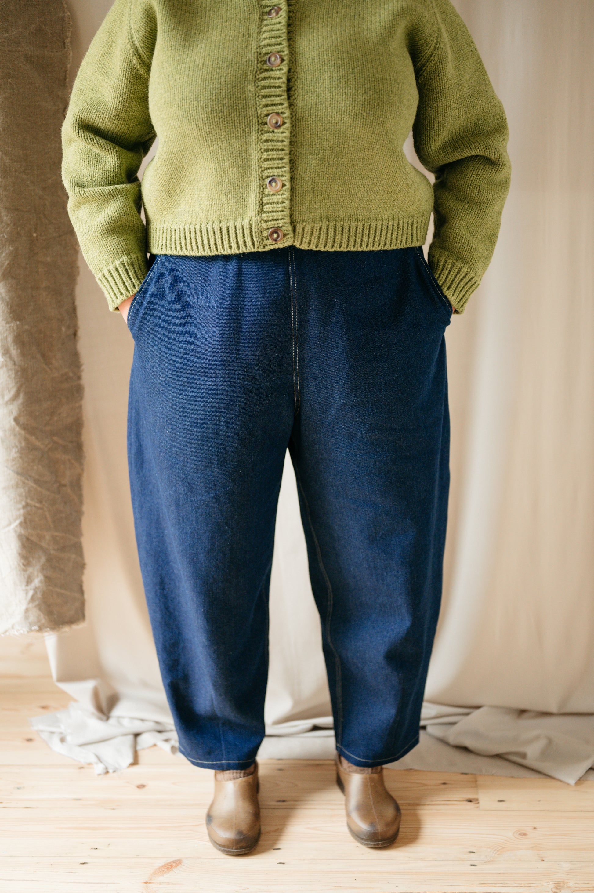 denim barrel leg jeans Styled with a chunky knit and boots