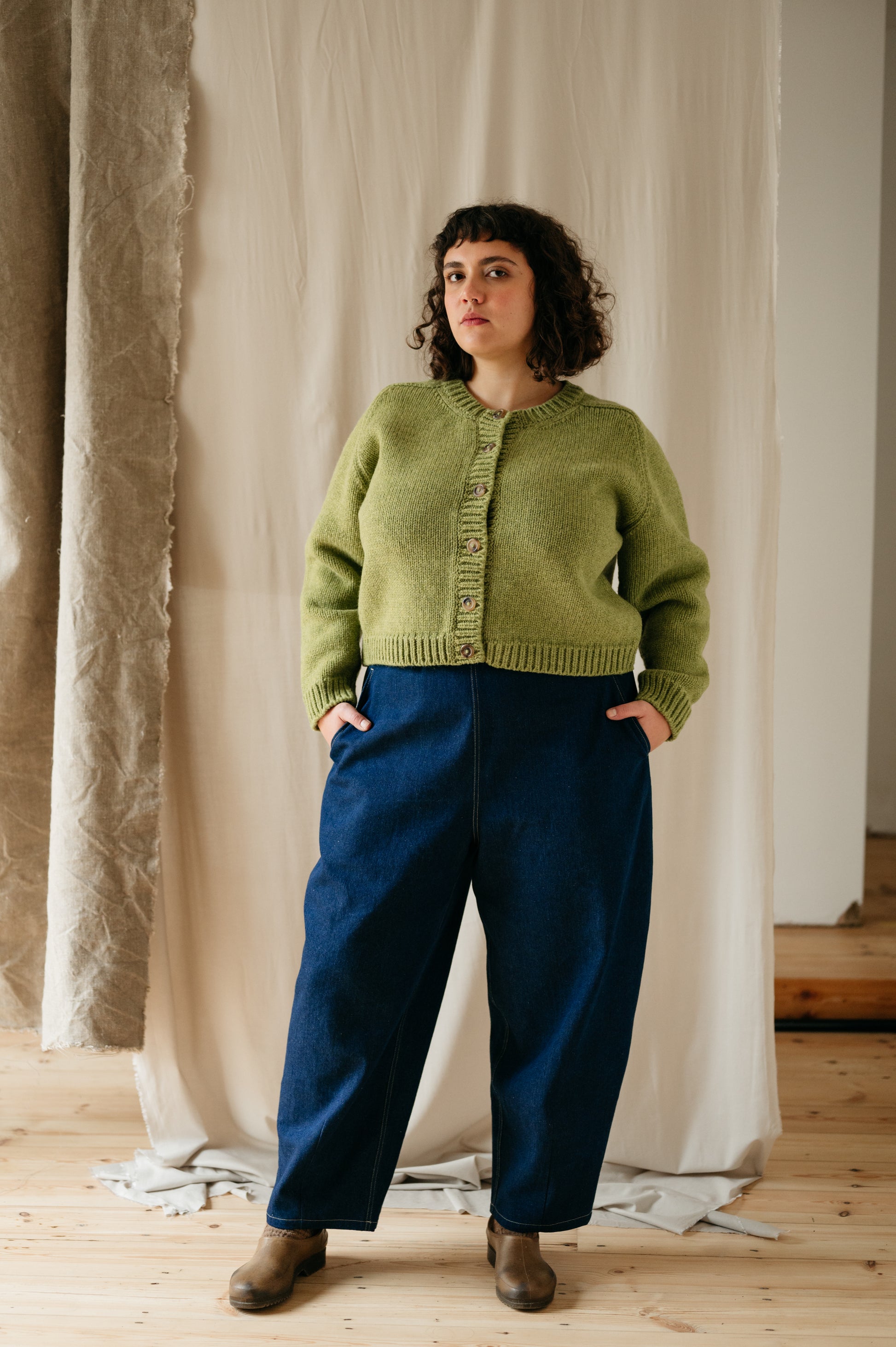 Model wearing barrel leg denim trousers – full front view