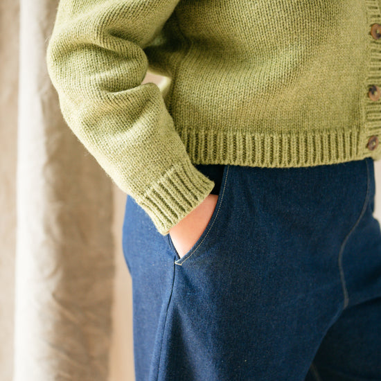 Close-up of curved leg silhouette and pockets