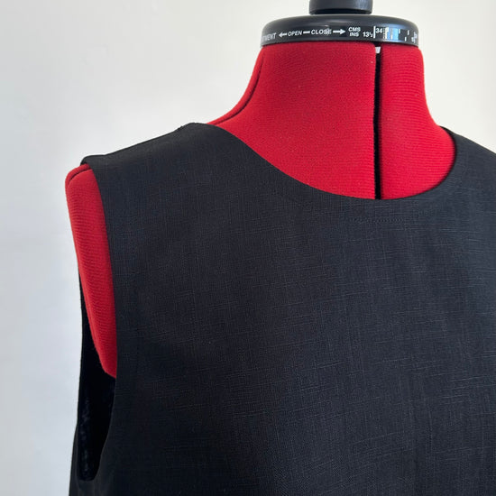 close up of a handmade black linen maxi dress