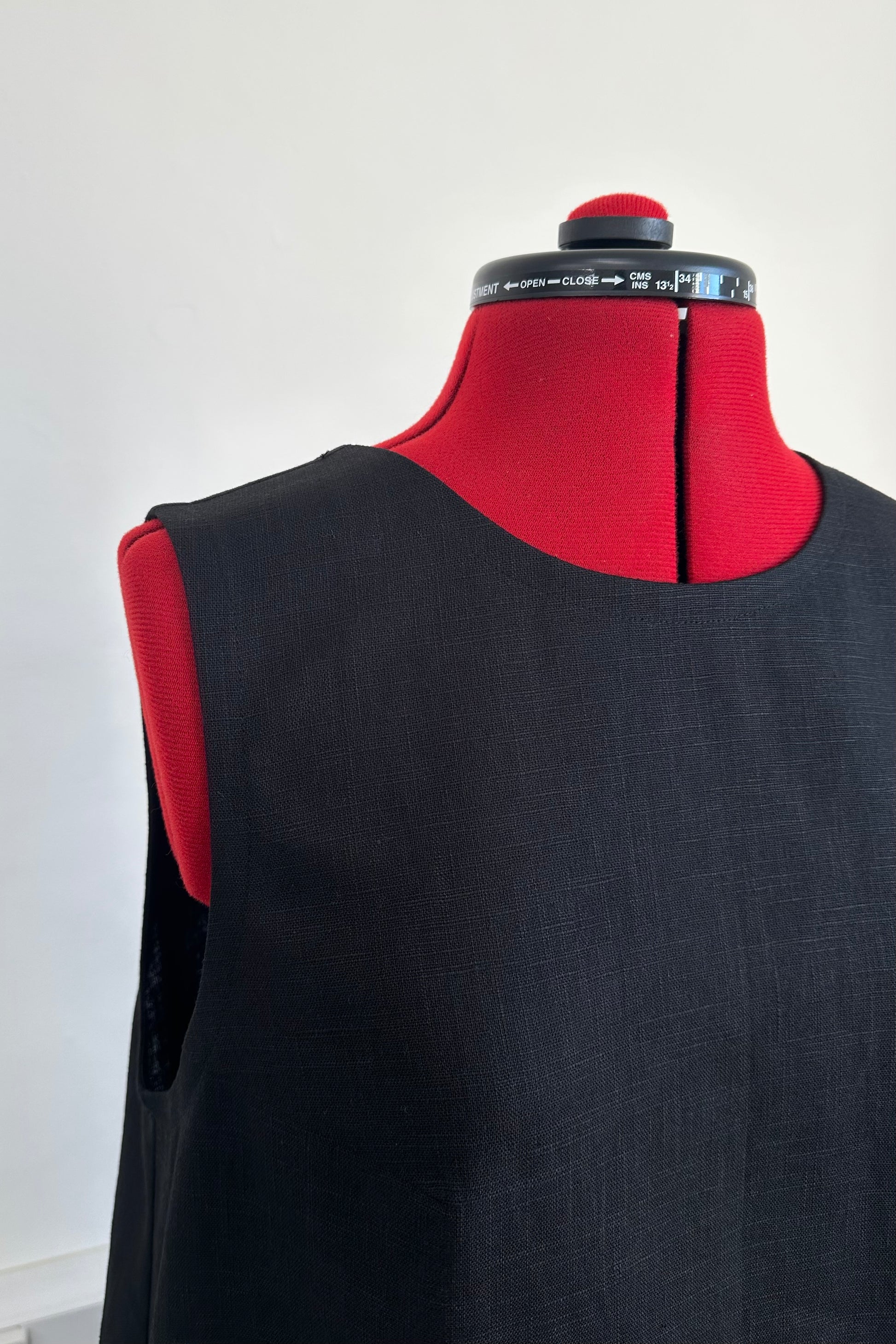 close up of a handmade black linen maxi dress