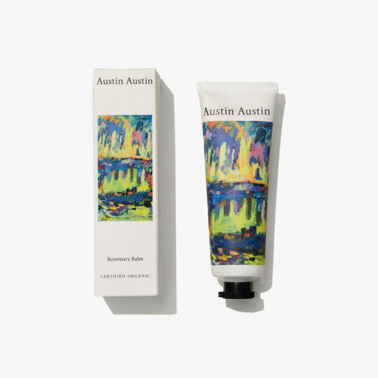 Austin Austin hand balm with colorful design and matching box on a white background