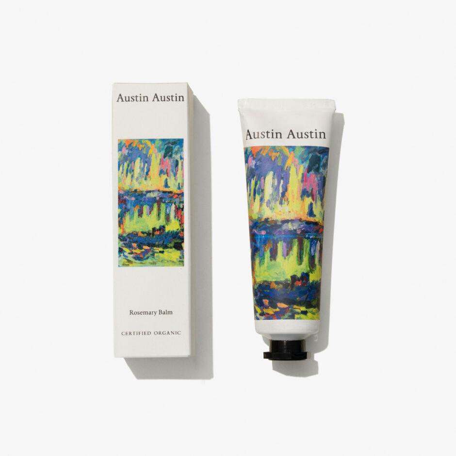Austin Austin hand balm with colorful design and matching box on a white background