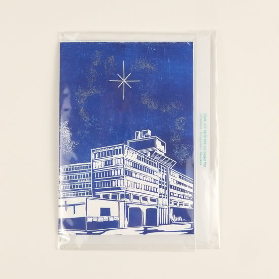 Blue and white architectural illustration on a beige background