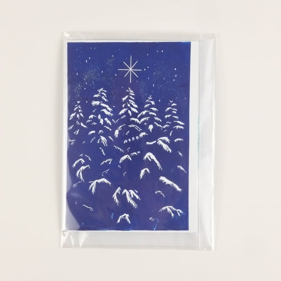 Framed artwork with blue abstract design on a white background