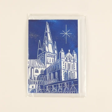 Rectangular blue card with white architectural design on a beige background