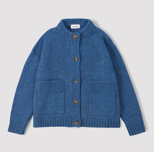 Blue cardigan on a white background 