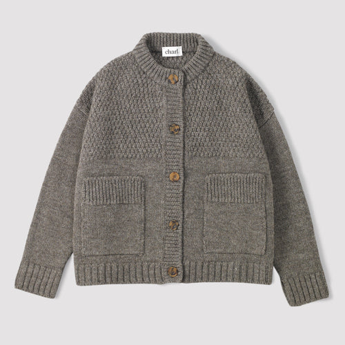 Grey knitten british wool cardigan on a white background
