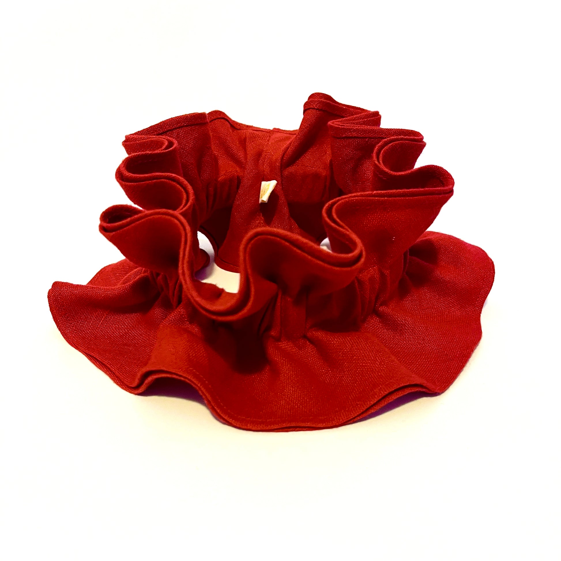 Scarlet red ruffle pie crust collar on a white background