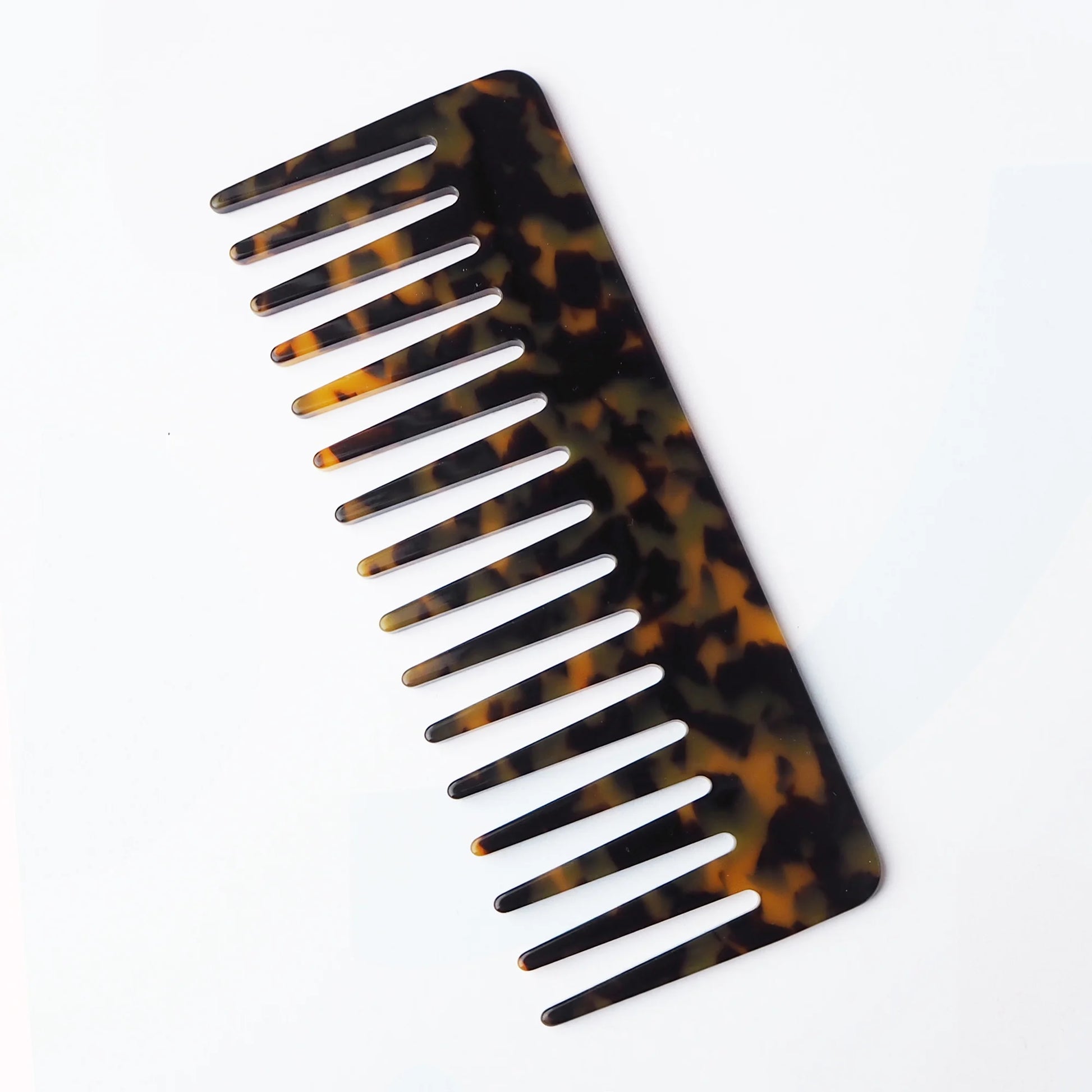 Tortoiseshell comb on a white background