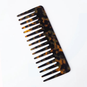 Tortoiseshell comb on a white background