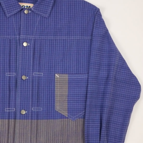 Blue checkered shirt with a gray stripe on a white background
