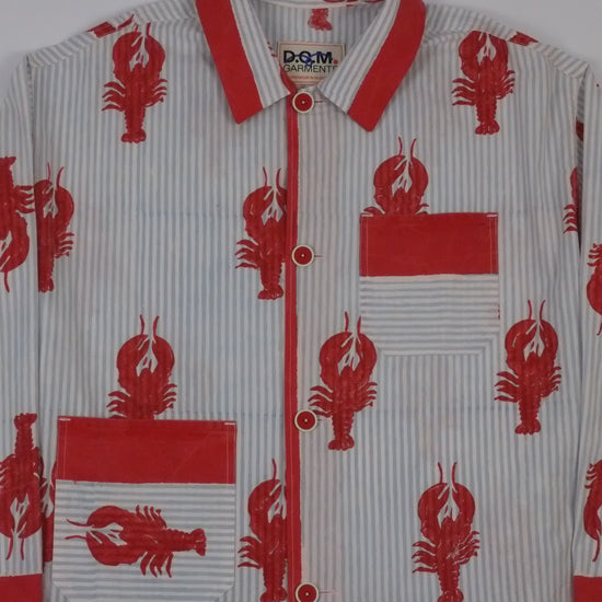 Red and white shirt with lobster pattern on a white background