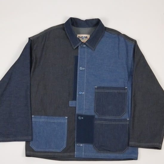 a patchwork denim jacket on a white background 