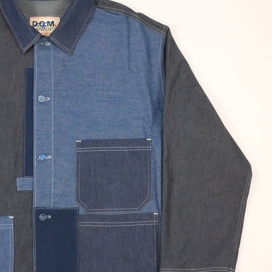 a patchwork denim jacket on a white background 