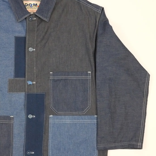 a patchwork denim jacket on a white background 