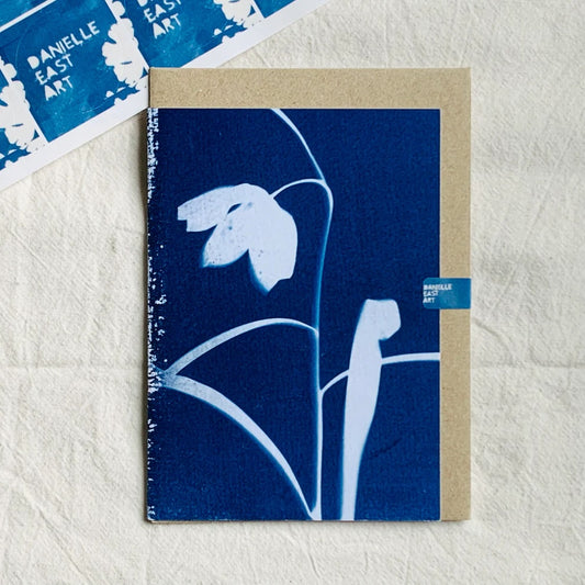Cyanotope greetings card with floral design on a textured surface, featuring 'Danielle East Art' branding.