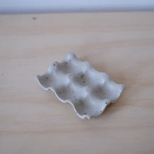 Load image into Gallery viewer, Small ceramic tray with textured surface on a wooden surface
