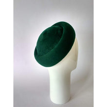 Load image into Gallery viewer, Green beret on a white mannequin head against a light gray background
