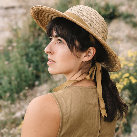 woman wearing a straw hat