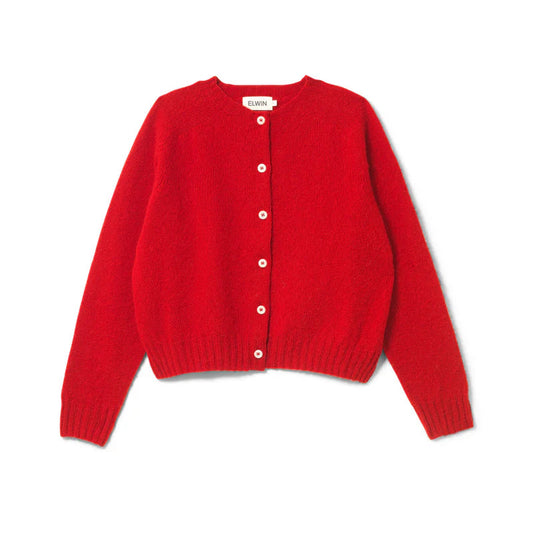 Red cardigan on a white background