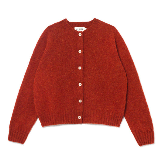 Red knitted cardigan on a white background