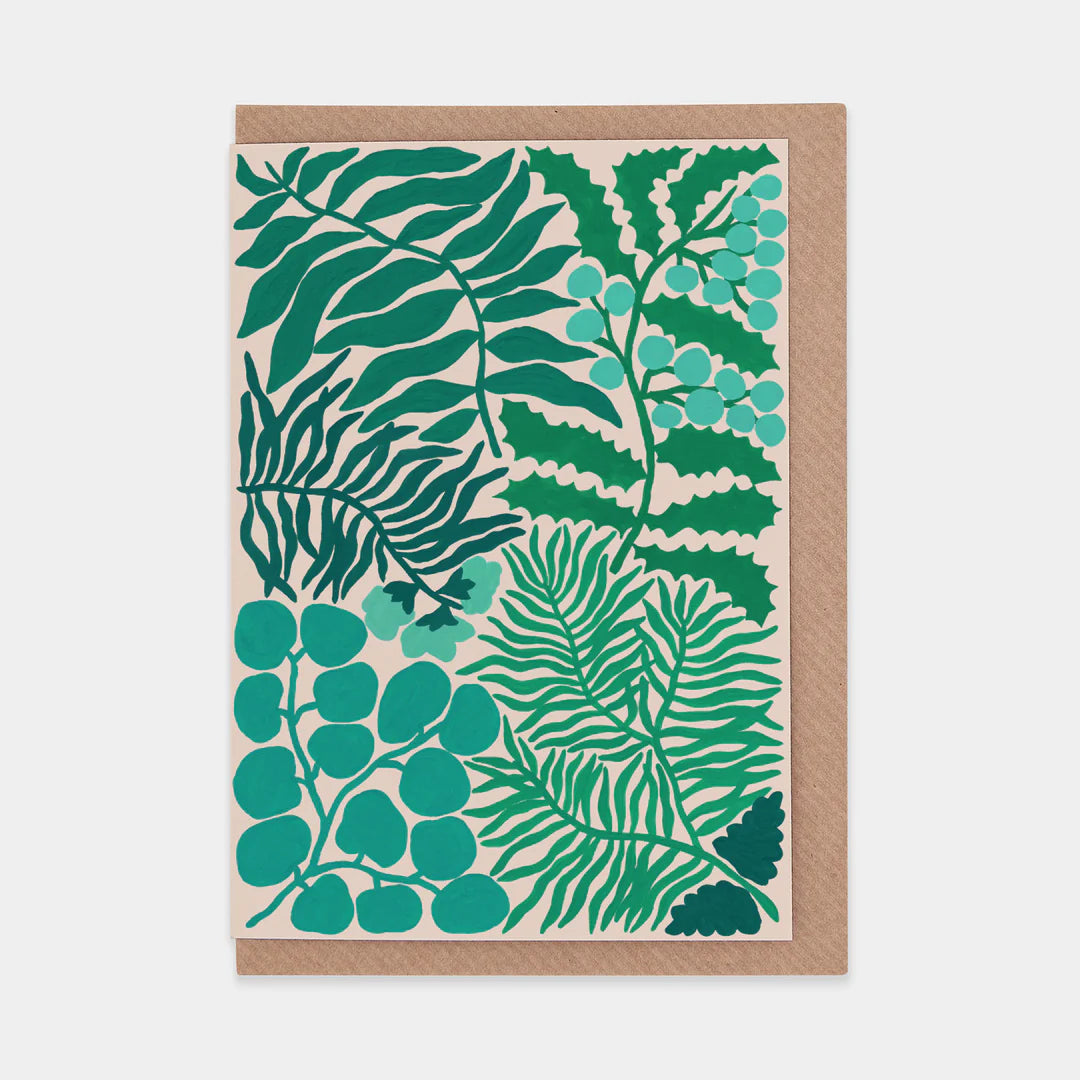 Greeting card with green leaf pattern on a brown envelope