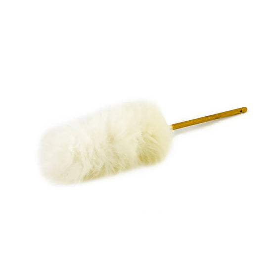 White lambswool duster with a wooden handle on a white background