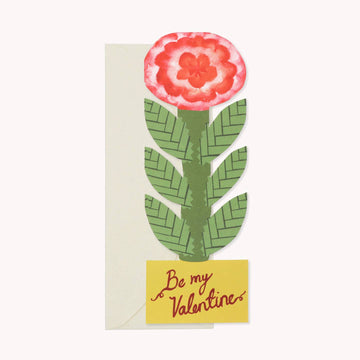 A card of a flower with the words be my valentine on the front 